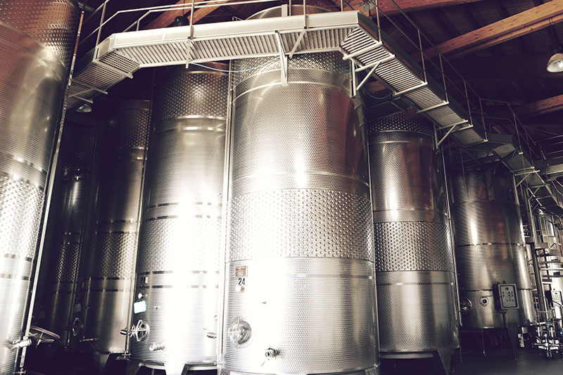 Stainless steel winemaking tanks at the winery